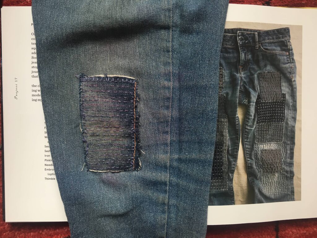 My finiished mended jeans for Plant dyeing and mending: a book review